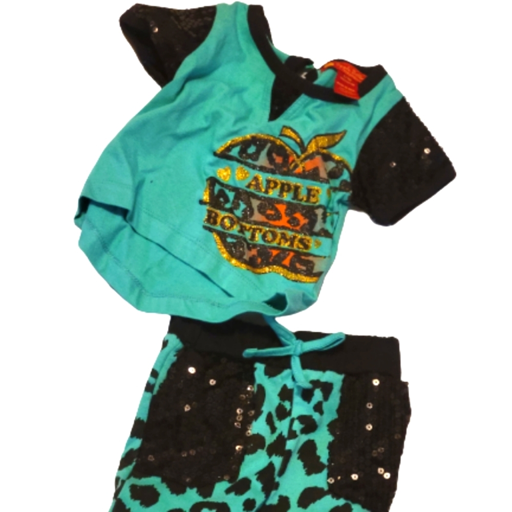 Apple Bottom top and pant set with glitter like sleeve and pocket accents.